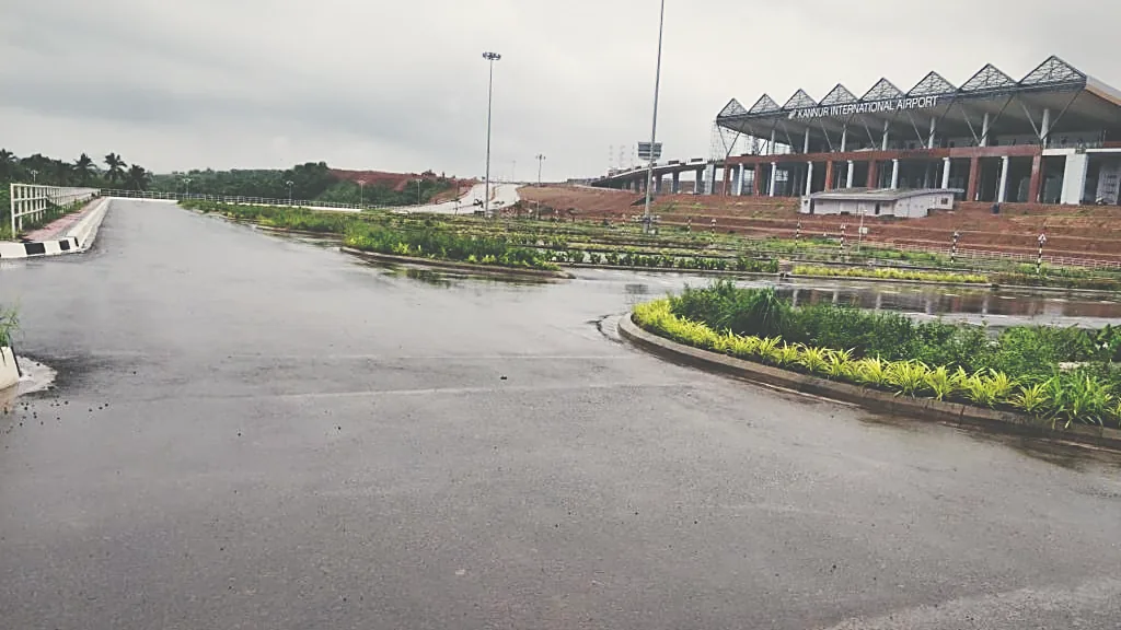 Kannur International Airport terminal, approach road and median planting